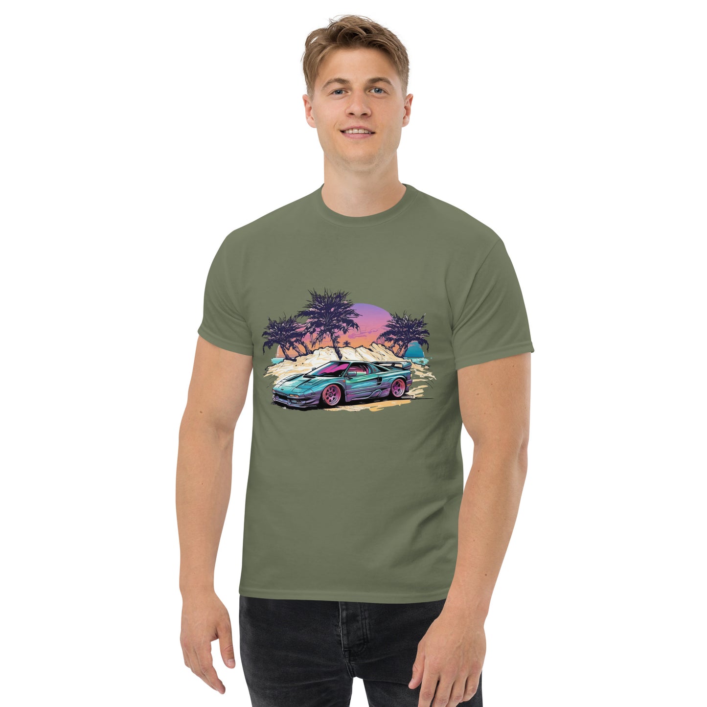 man with military green t-shirt with picture of vintage car in front of palm trees 