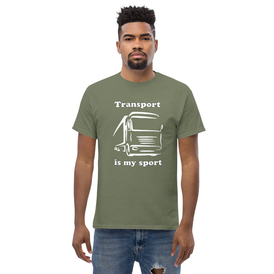 Man with military green t-shirt with picture of truck and text "Transport is my sport"