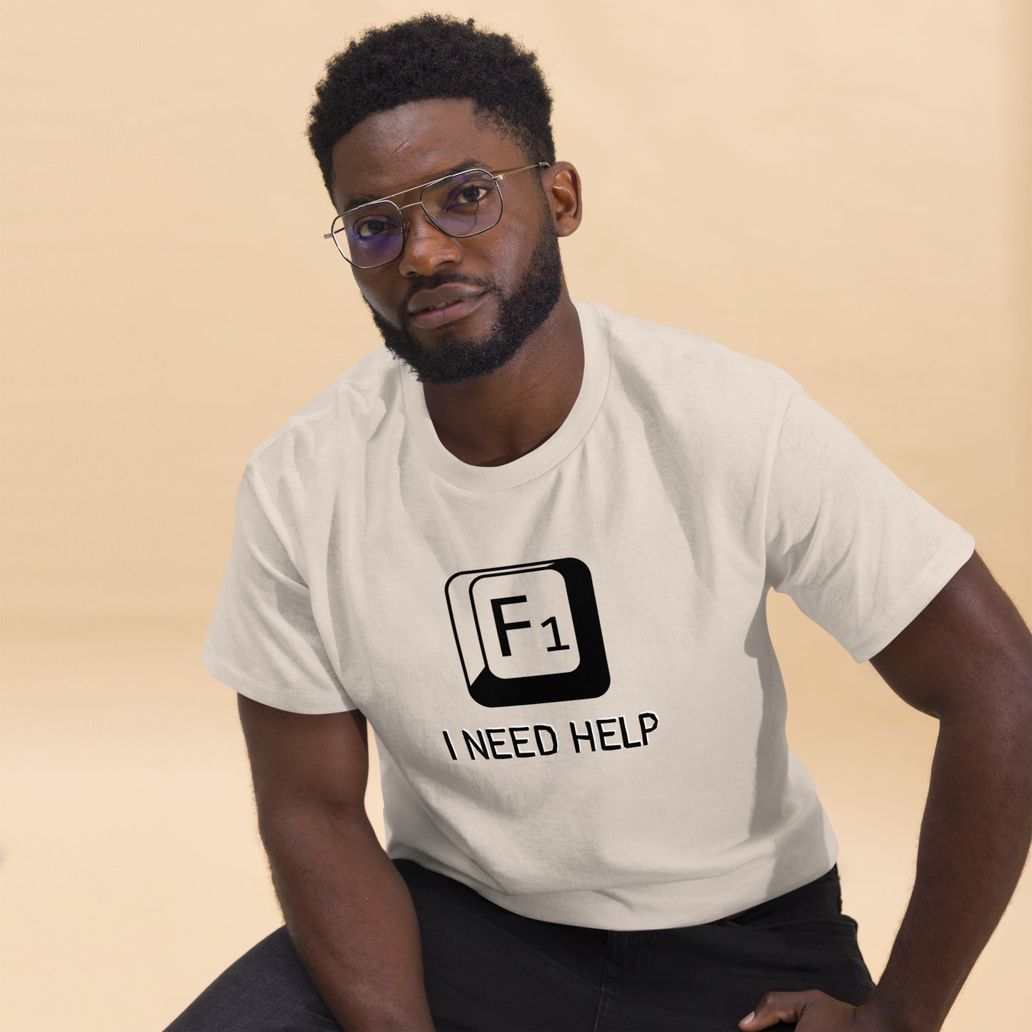 Men with Natural T-shirt and a picture of F1 key with text "I need help"