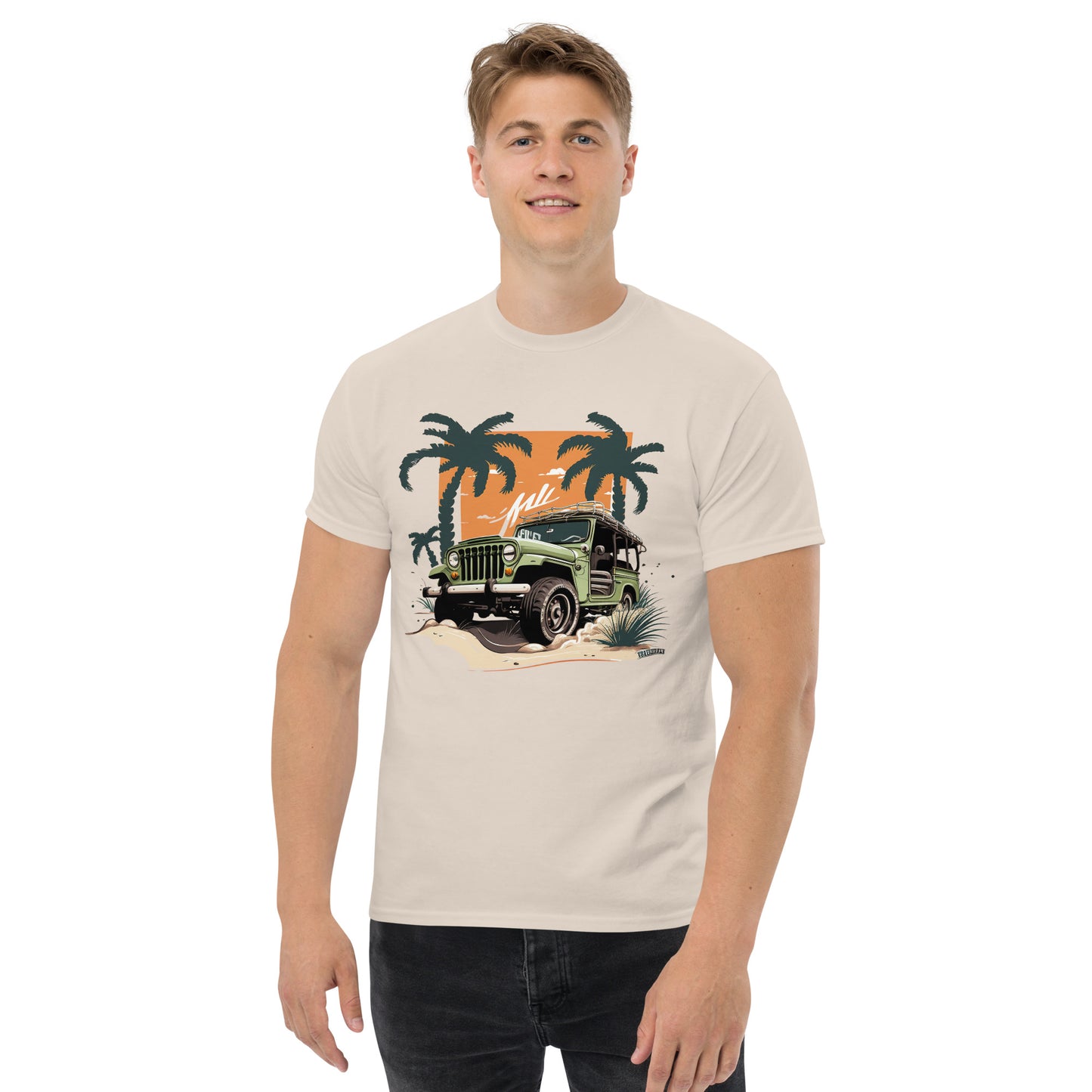 man with natural t-shirt with picture of jeep in front of palm trees