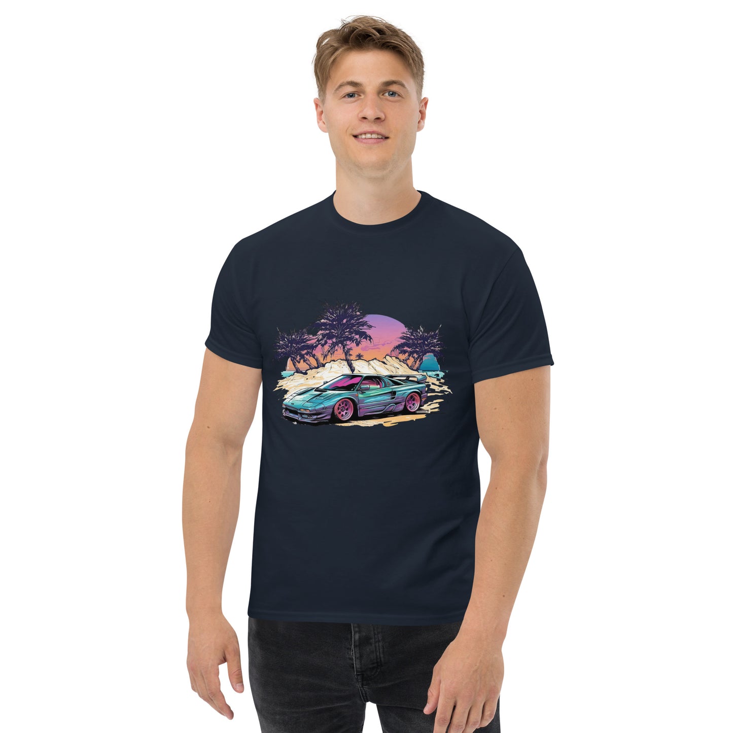 man with navy blue t-shirt with picture of vintage car in front of palm trees