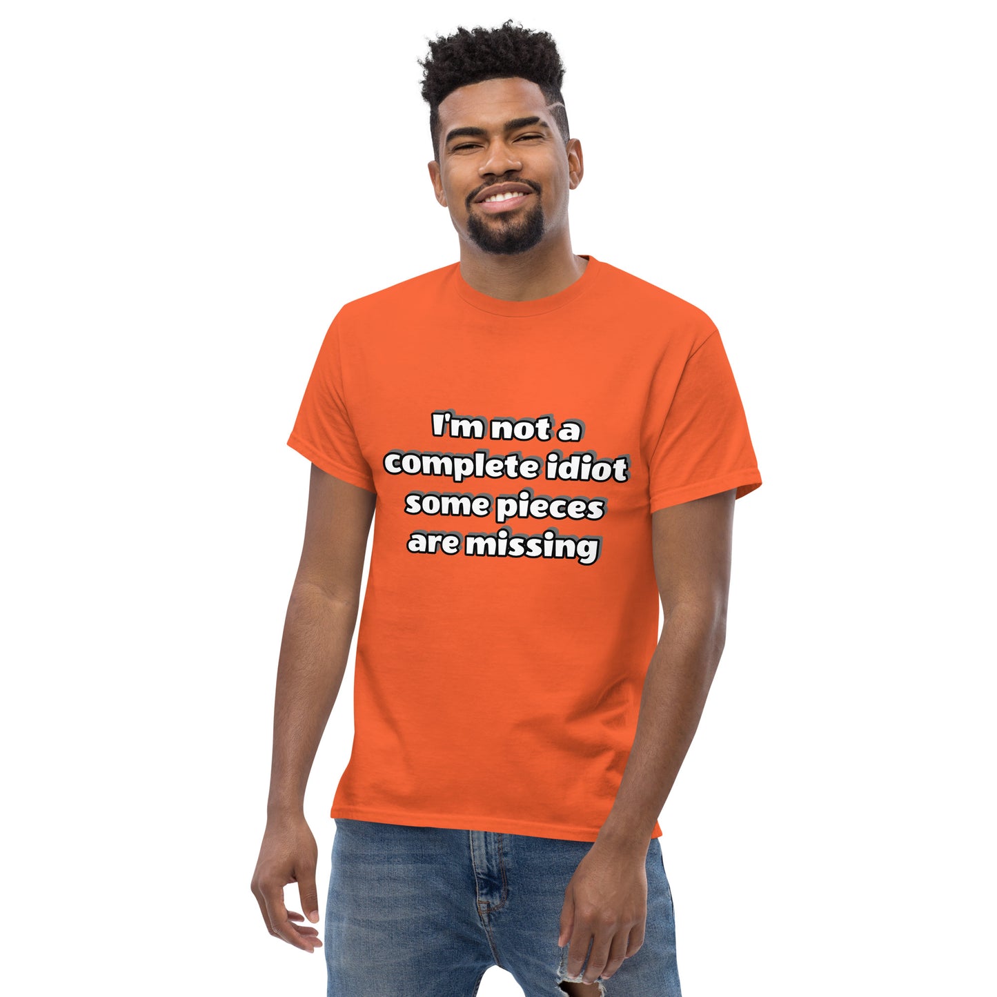 Men with orange t-shirt with text “I’m not a complete idiot, some pieces are missing”