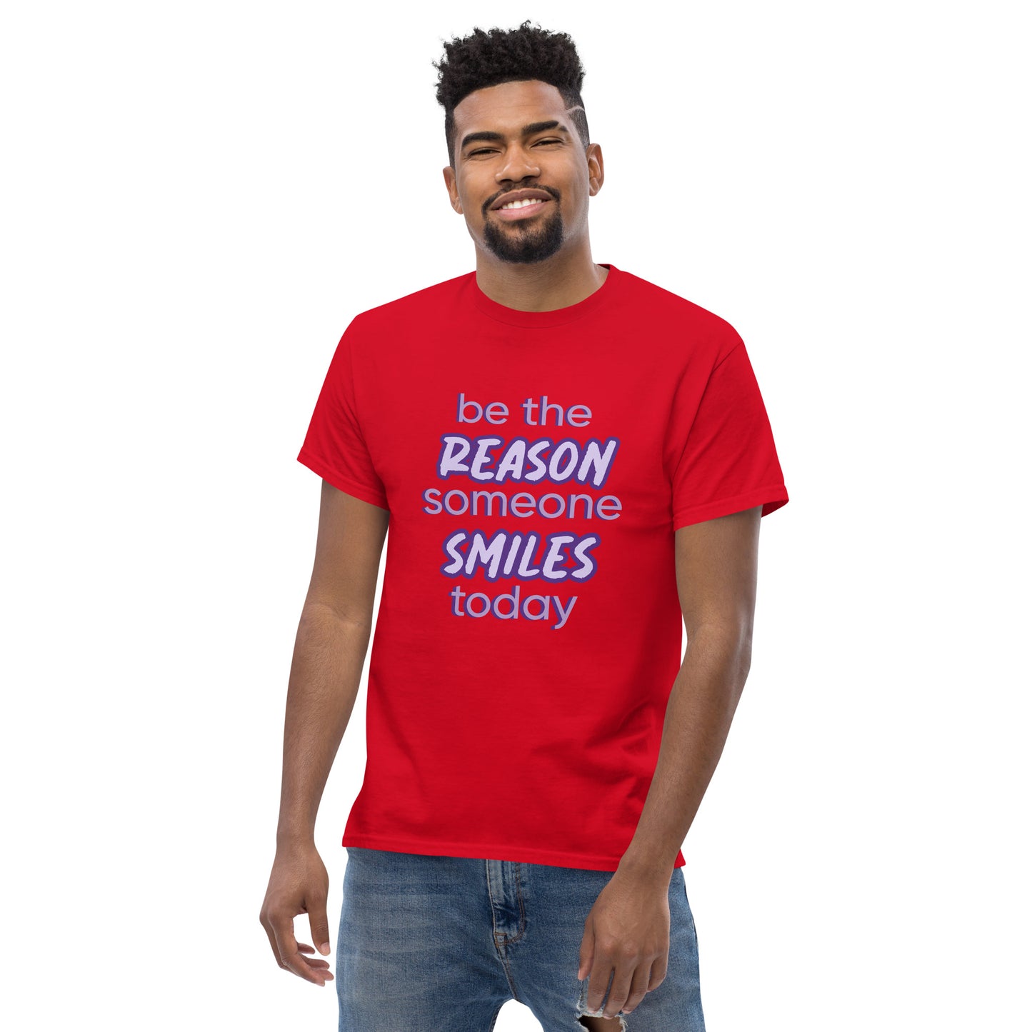 Men with red T-shirt and the quote "be the reason someone smiles today" in purple on it.