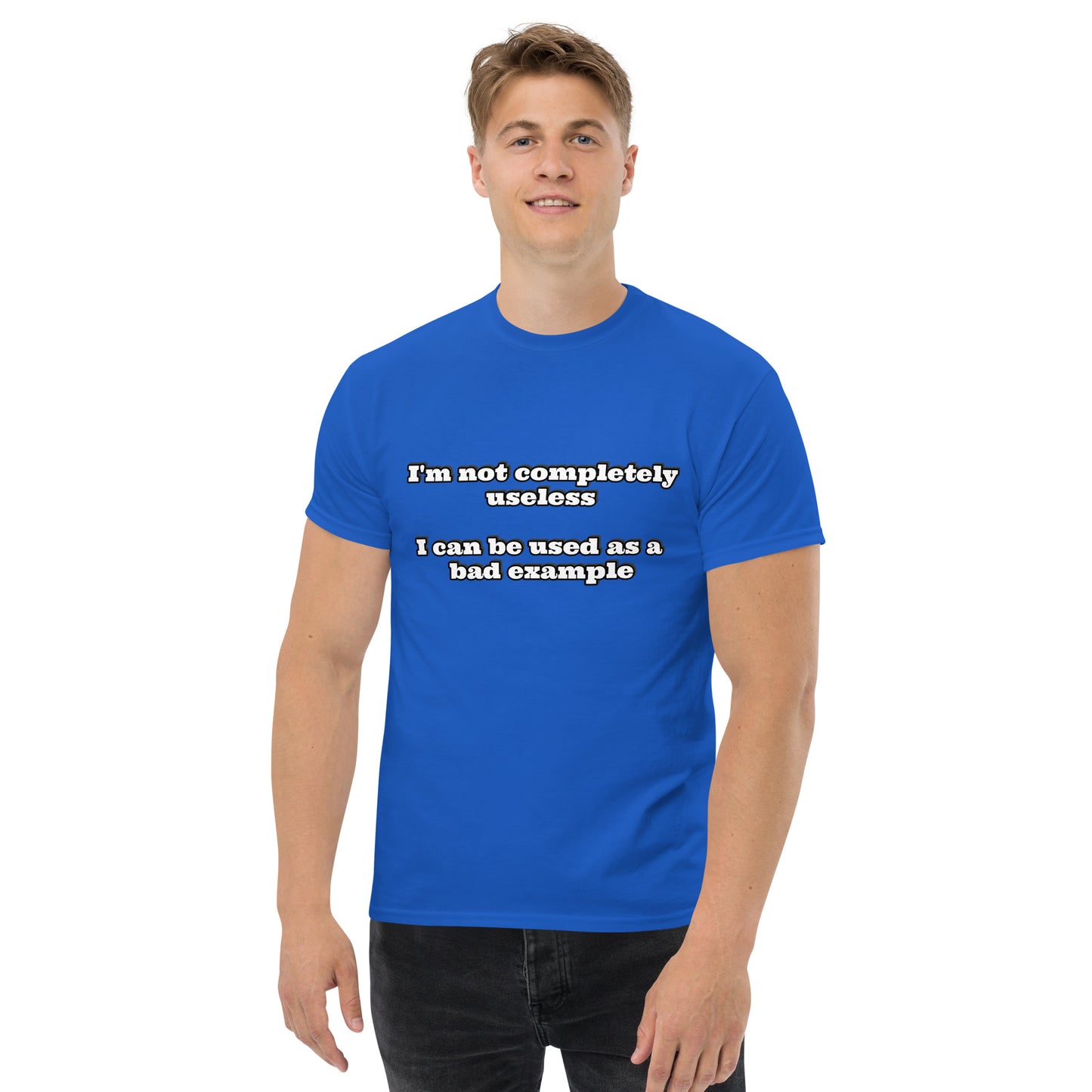 Men with royal blue t-shirt with text “I'm not completely useless I can be used as a bad example”