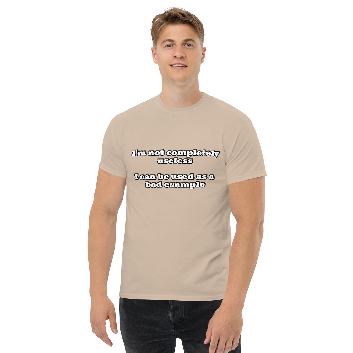 Men with sand t-shirt with text “I'm not completely useless I can be used as a bad example”