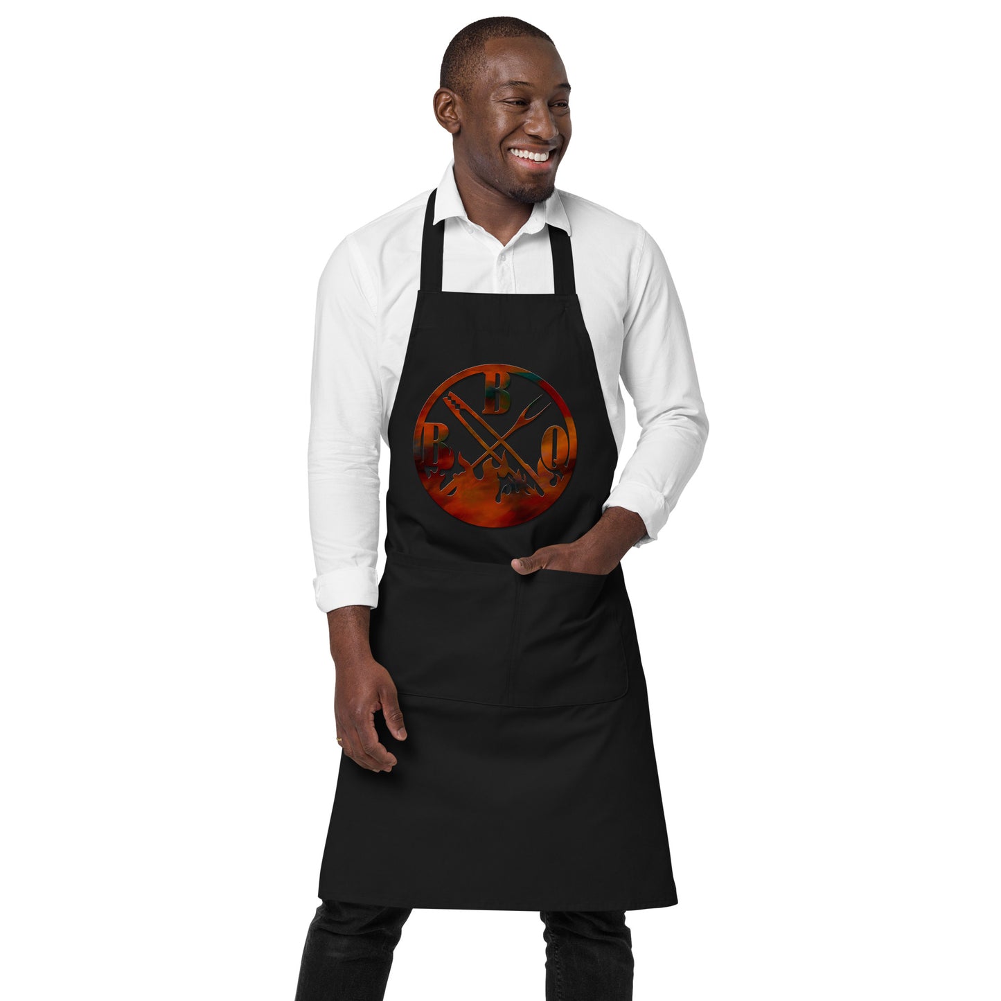 black apron with meat fork and text "BBQ"