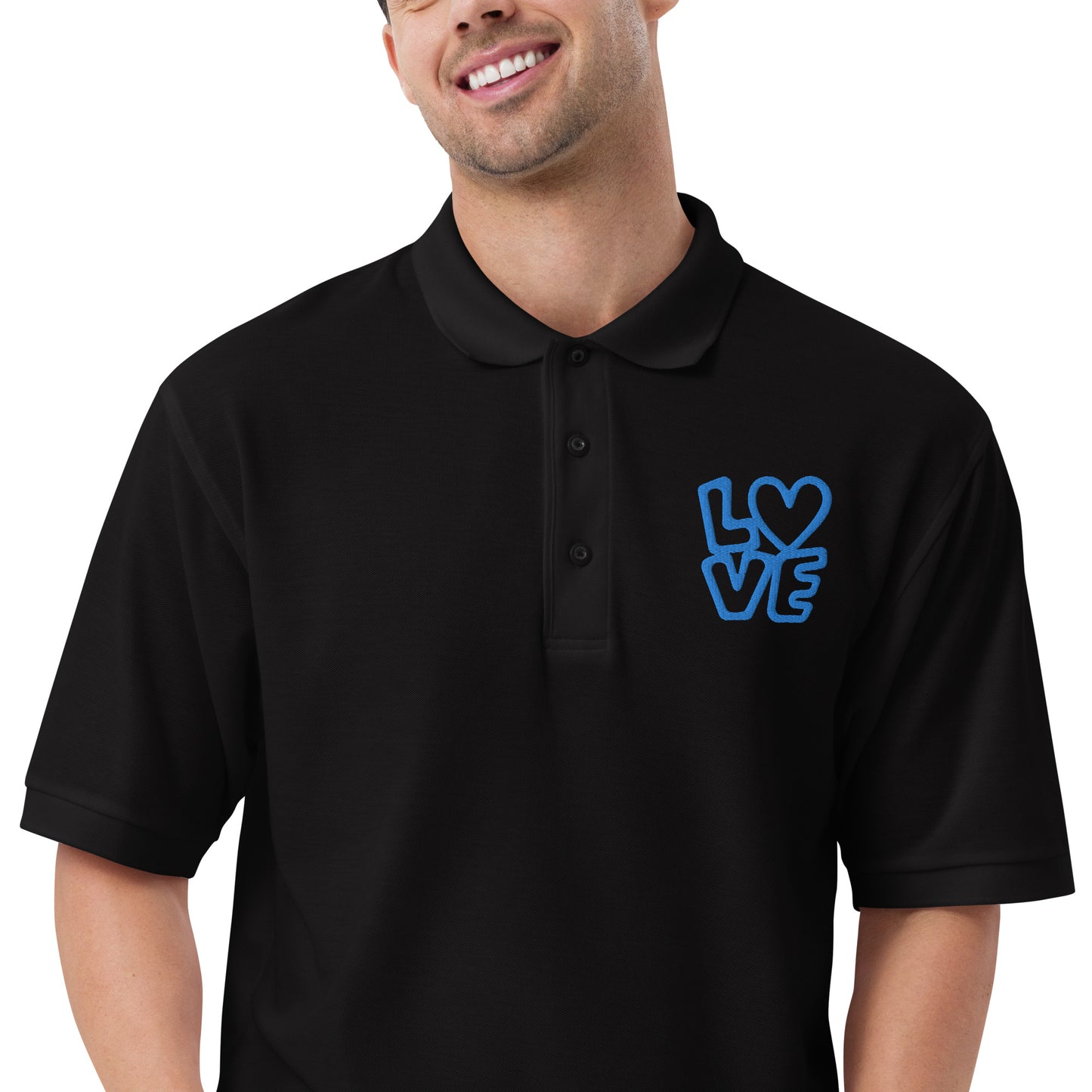 Men with black poloshirt with the blue letters LOVE with the O in heart shape