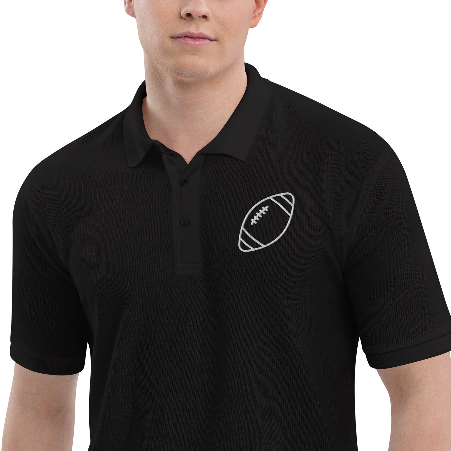 men with black polo with football