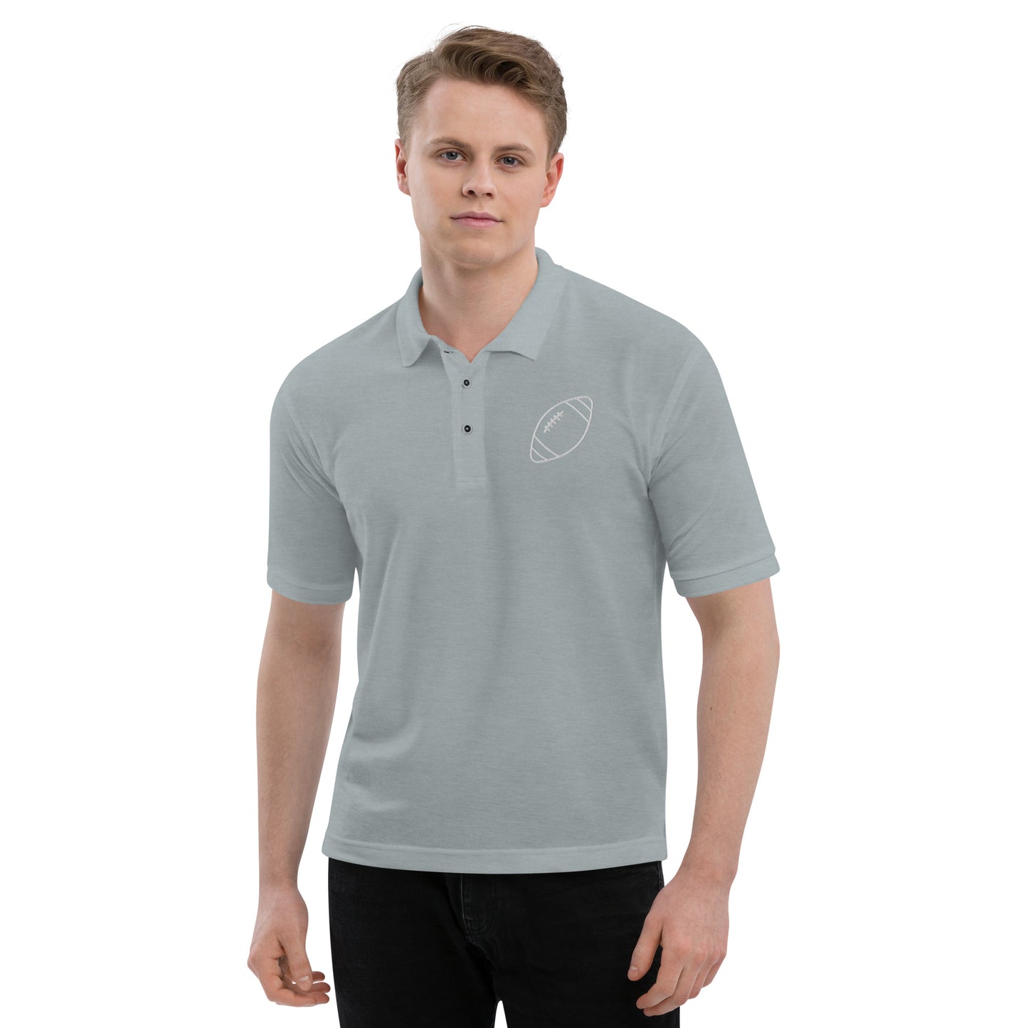men with grey polo with football