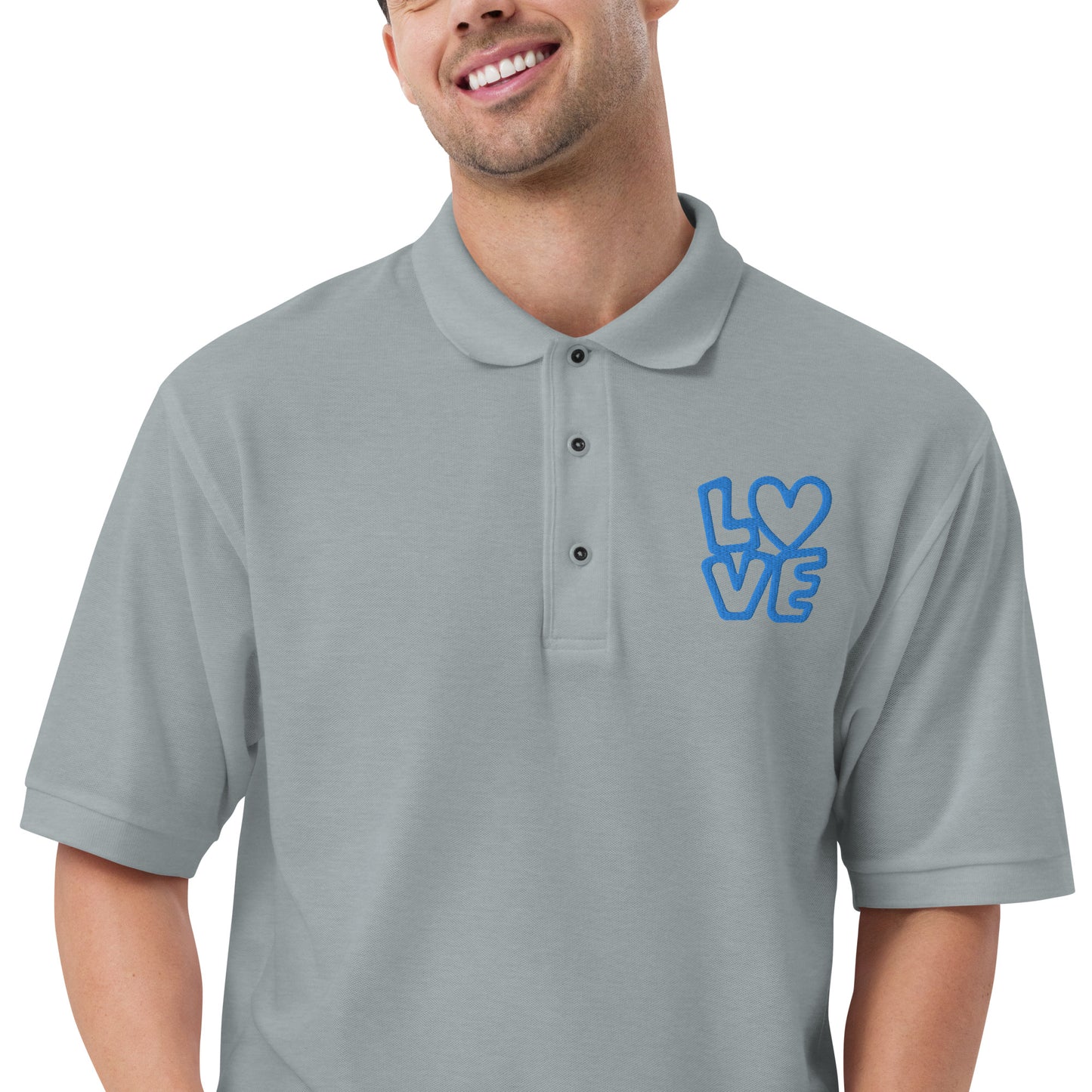 Men with grey poloshirt with the blue letters LOVE with the O in heart shape