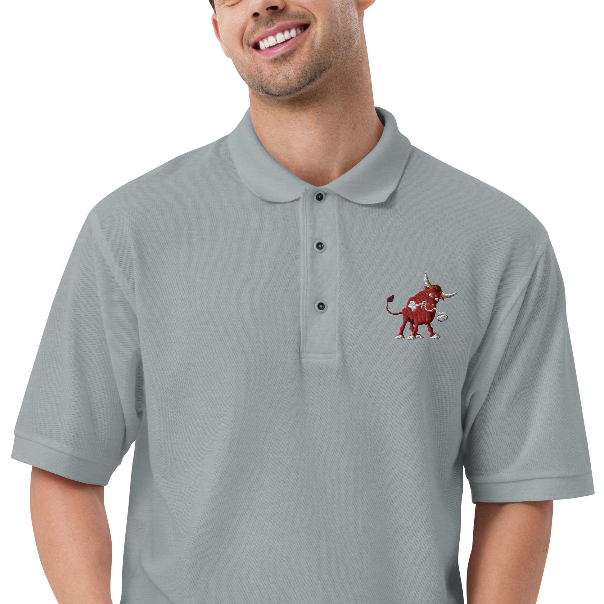 men with grey polo with bull