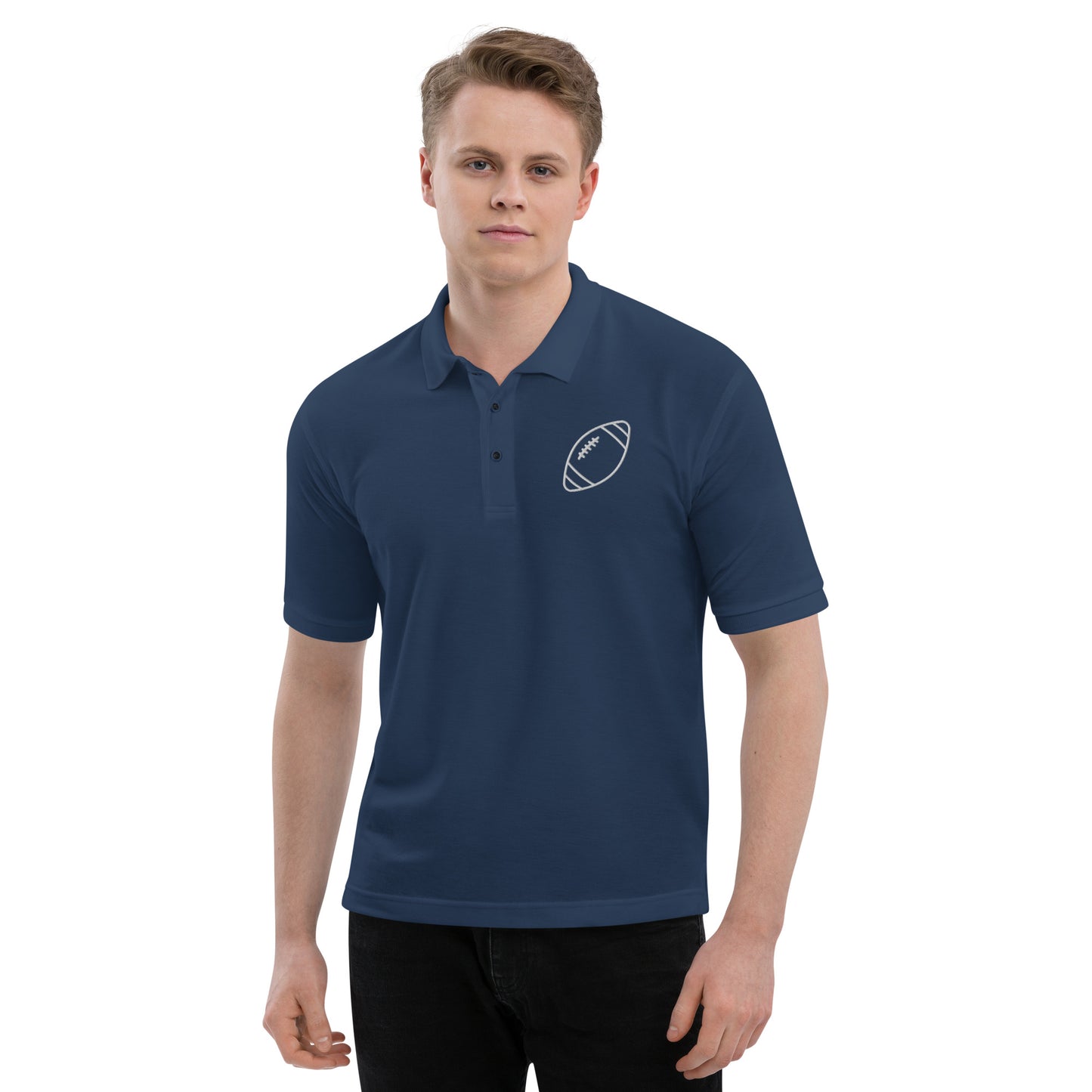 men with navy polo with football