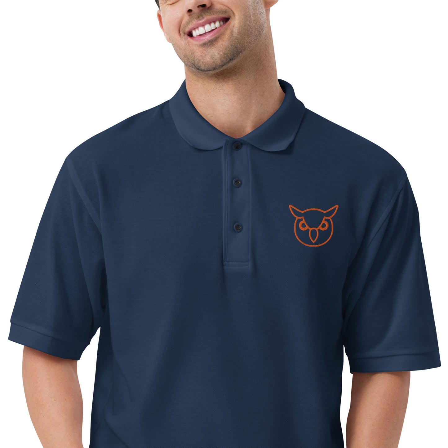 Men with navy poloshirt with on front a owl in brown embroidered