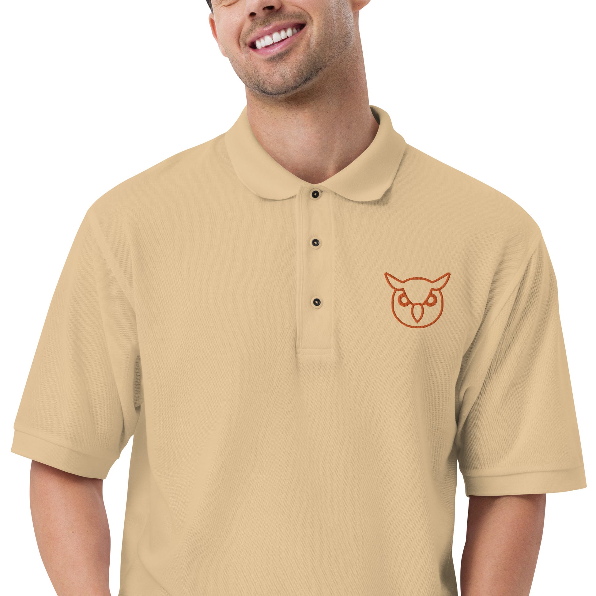 Men with stone poloshirt with on front a owl in brown embroidered