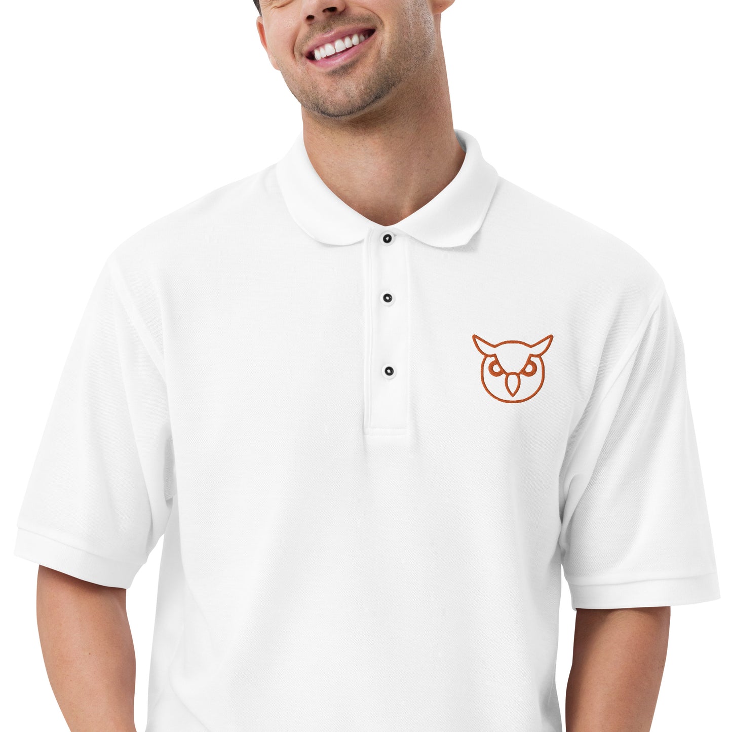 Men with white poloshirt with on front a owl in brown embroidered