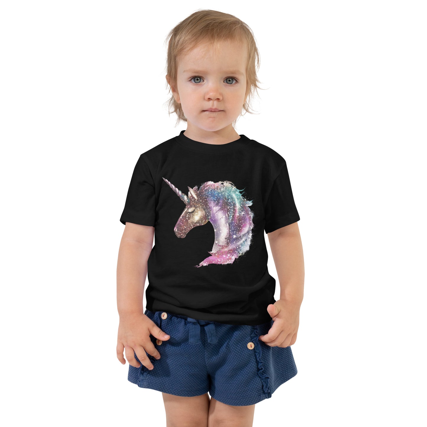 Toddler with black T-shirt with print of a unicorn