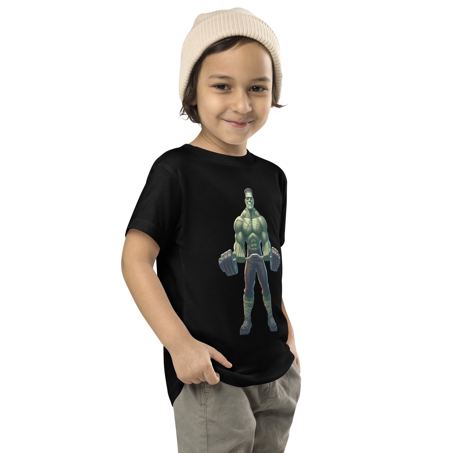 Toddler with black T-shirt with a print of a bodybuilder
