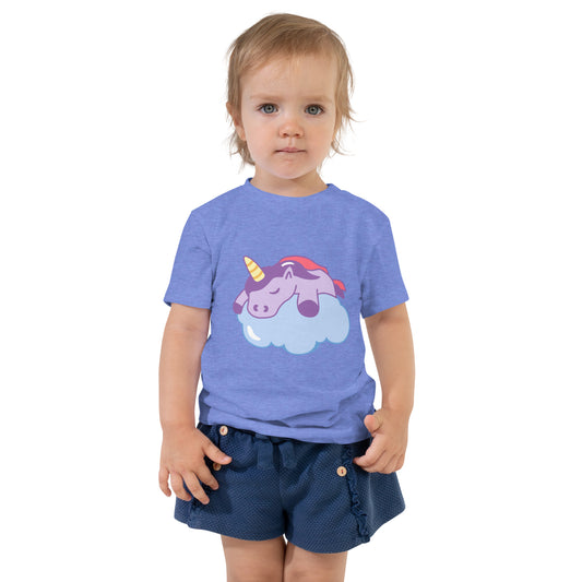 Toddler with a clombia blue T-shirt with a print of a sleeping unicorn on a cloud