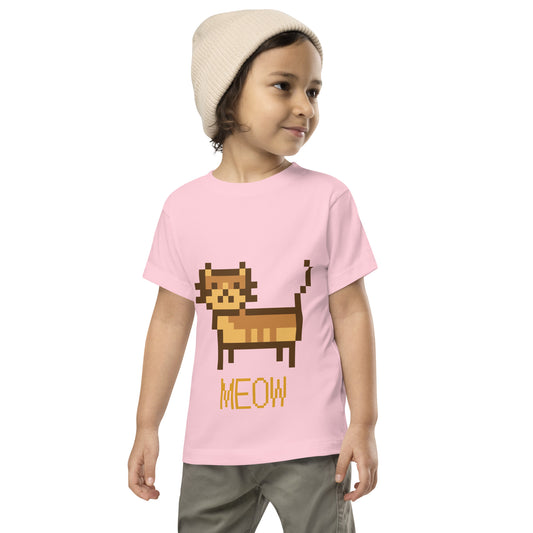 Toddler with pink T-shirt with short sleeve and a pixel picture of a cat and the text MEOW