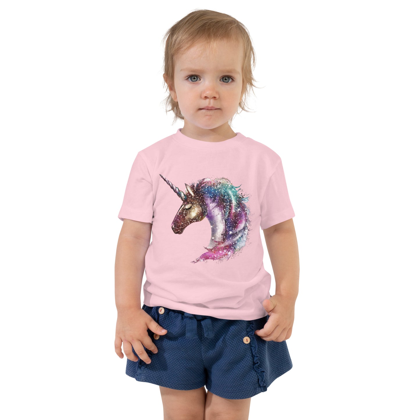 Toddler with pink T-shirt with print of a unicorn
