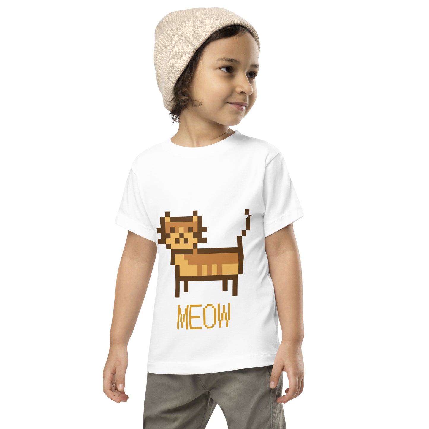 Toddler with white T-shirt with short sleeve and a pixel picture of a cat and the text MEOW