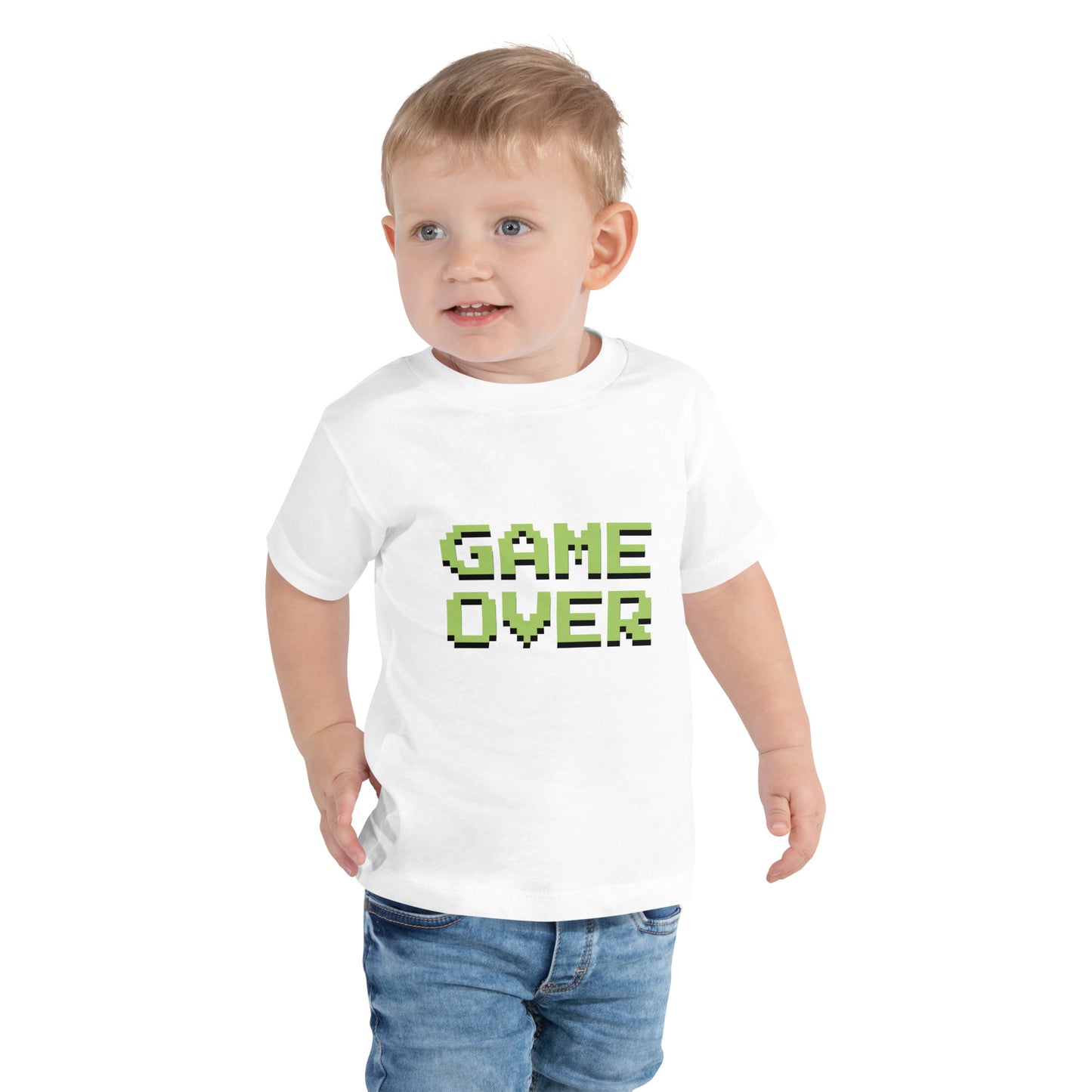 Toddler with white T-shirt with the text GAME OVER in green