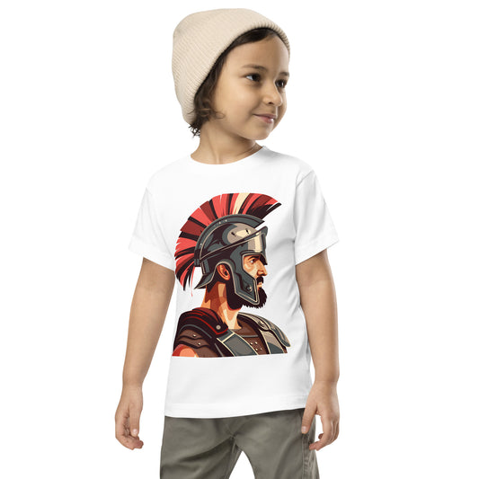 Toddler with a white T-shirt with a print of a warrior