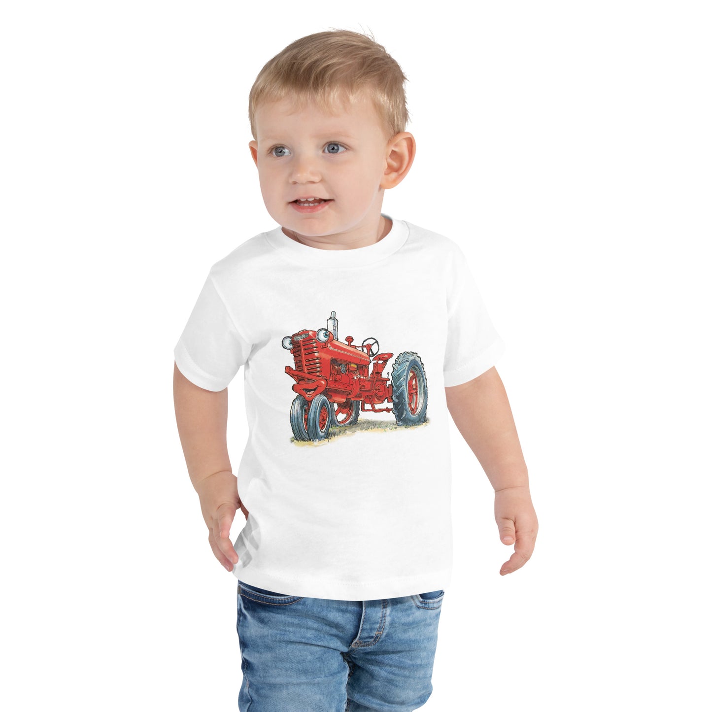 Baby with White body and a print of a red tractor
