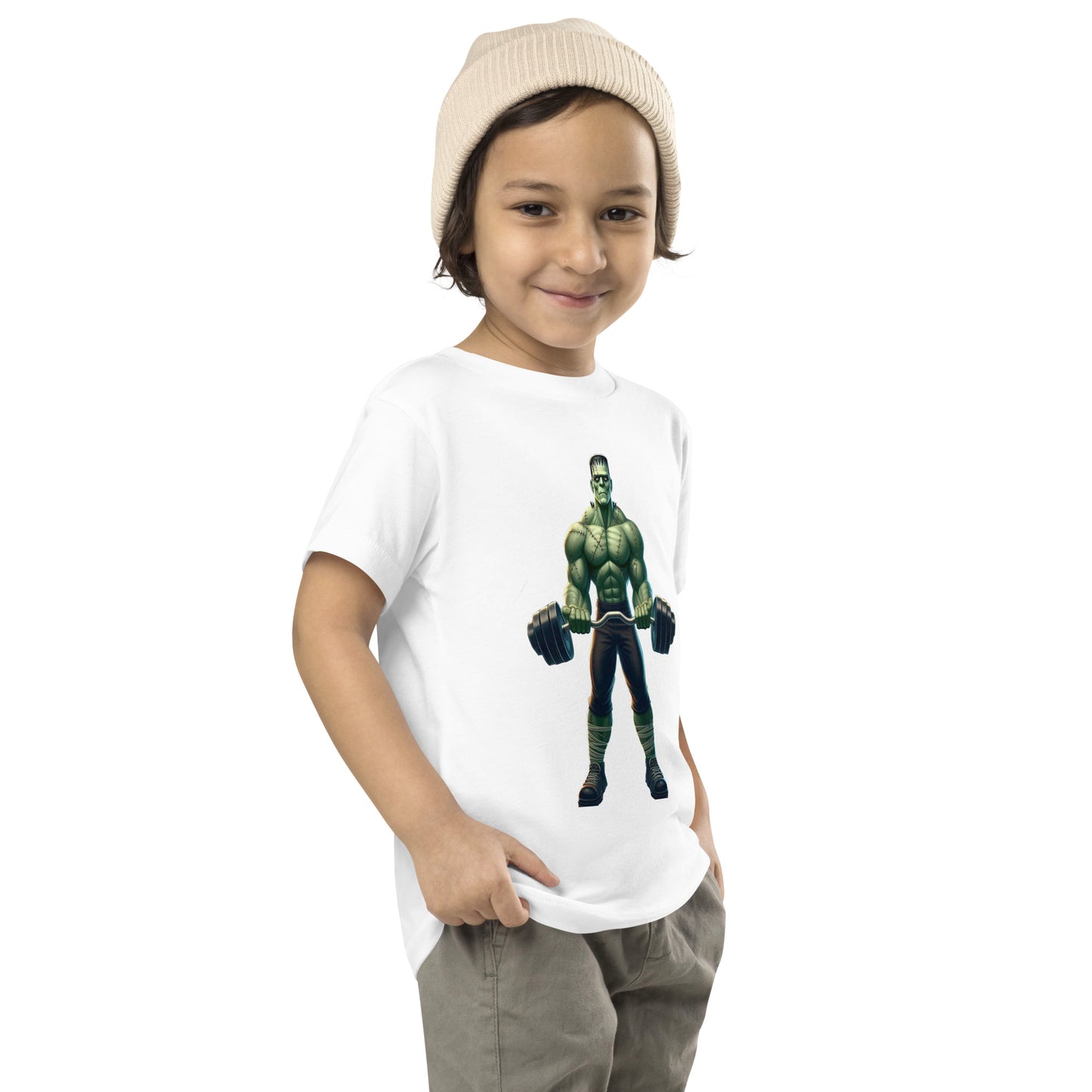Toddler with white T-shirt with a print of a bodybuilder