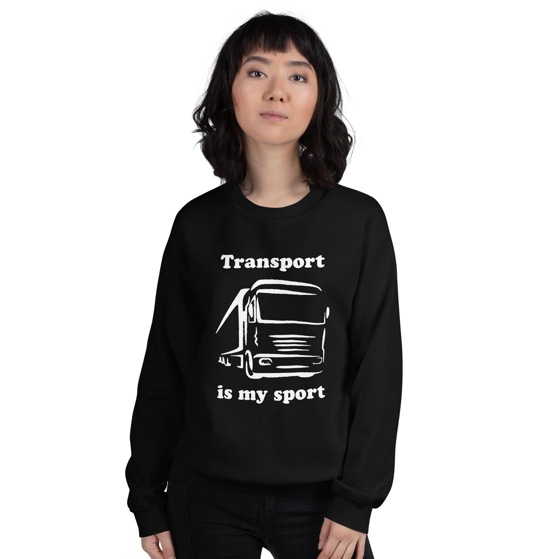 Woman with black sweatshirt with picture of truck and text "Transport is my sport"