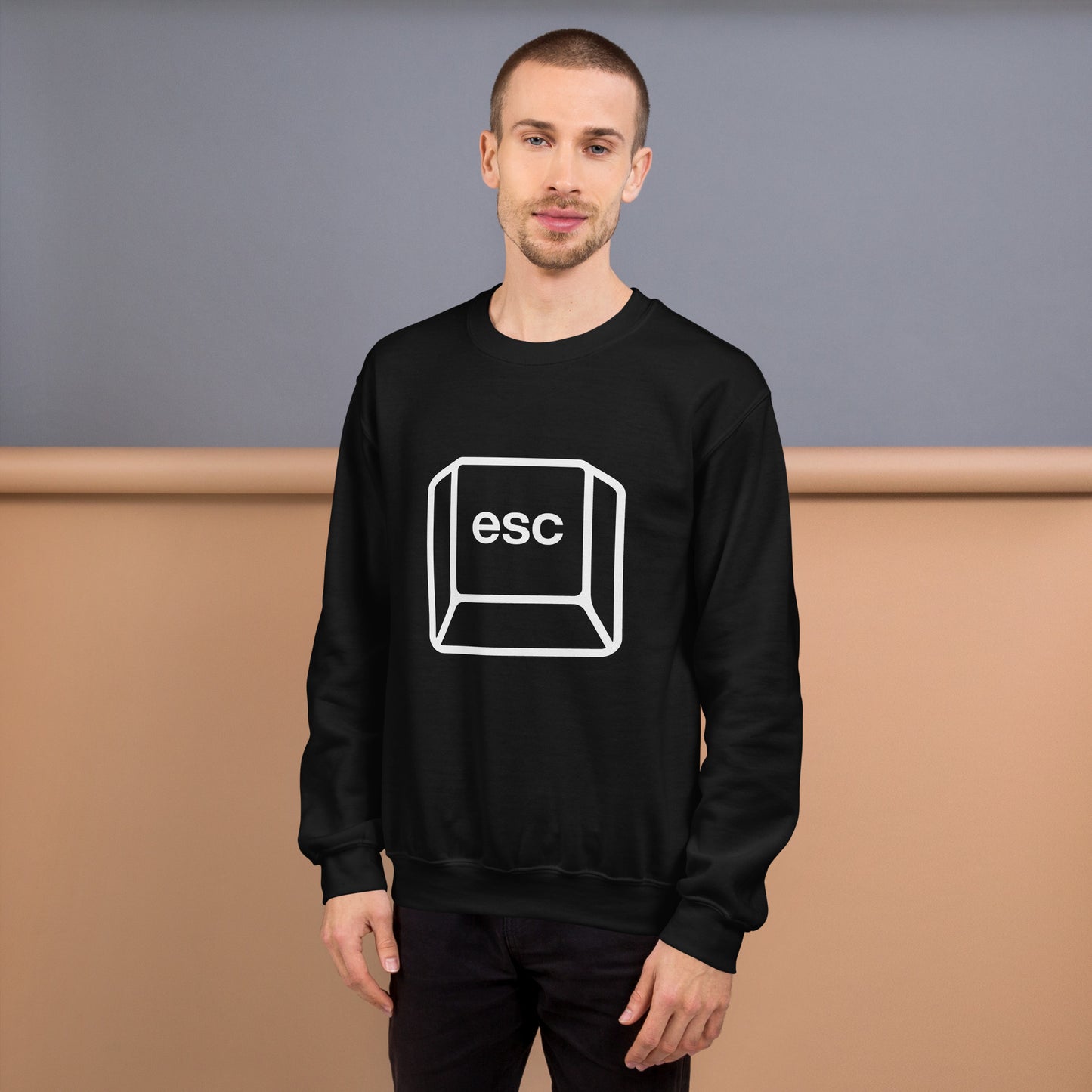 Man with black sweatshirt with picture of esc key