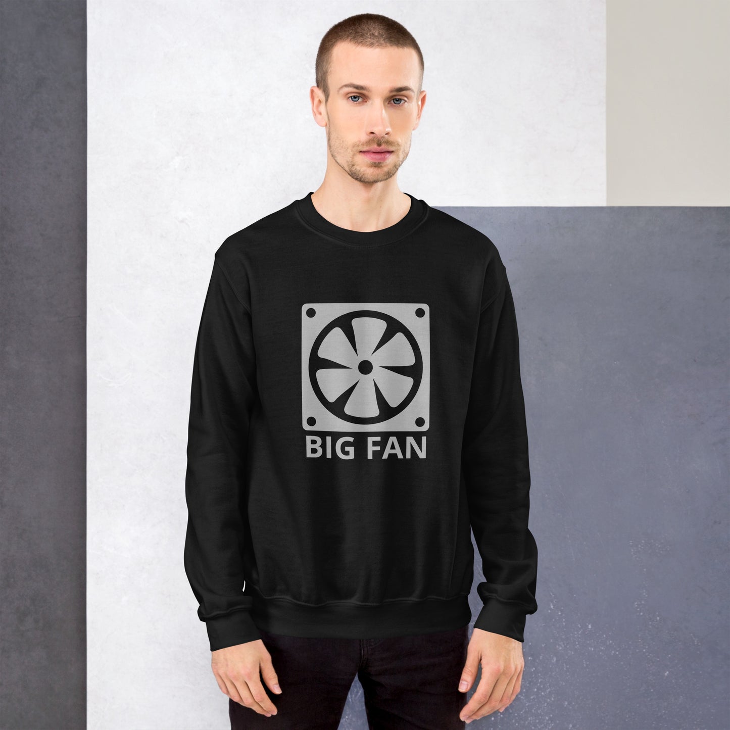 Men with black sweatshirt with image of a big computer fan and the text "BIG FAN"