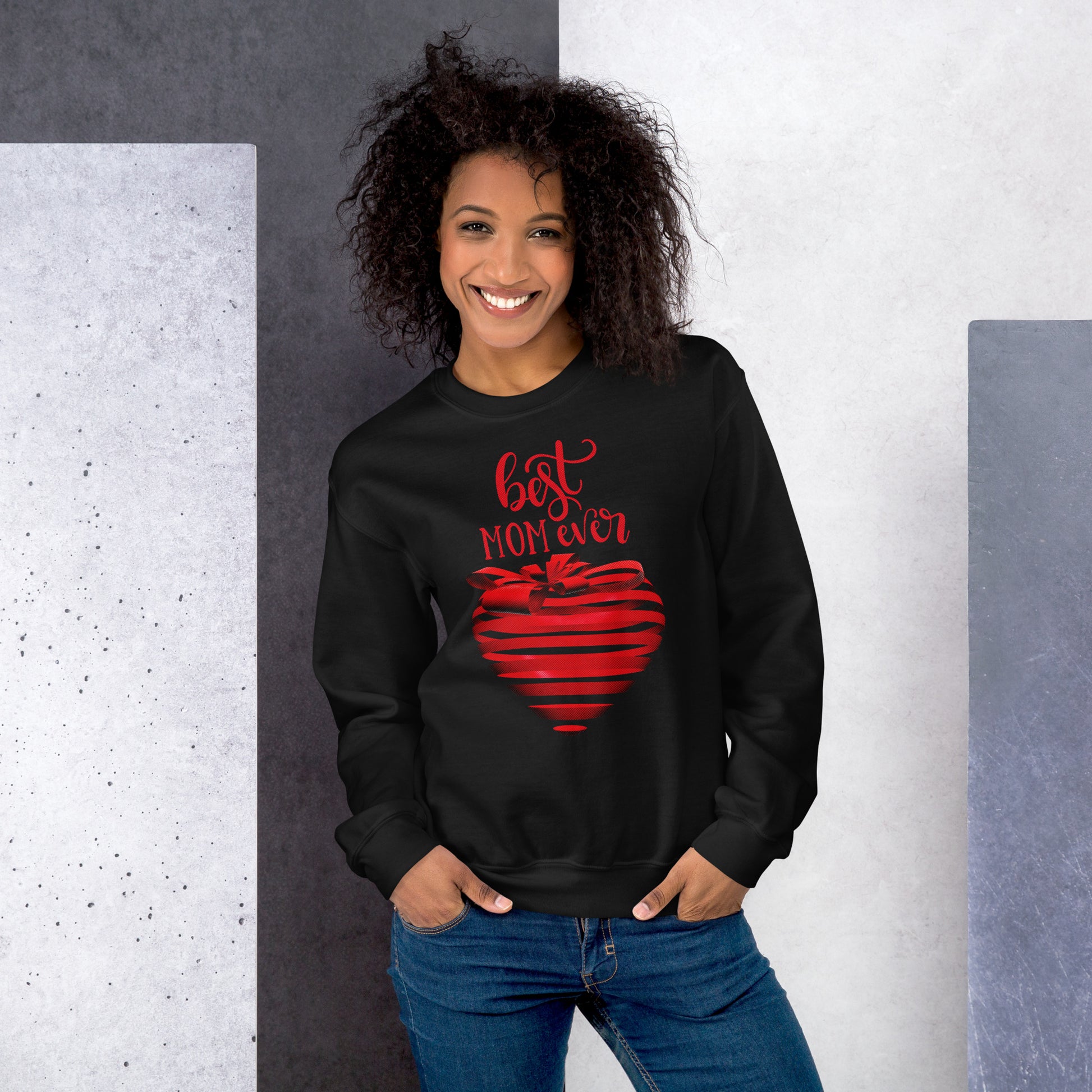 Women with black sweater with red text best MOM Ever and red heart