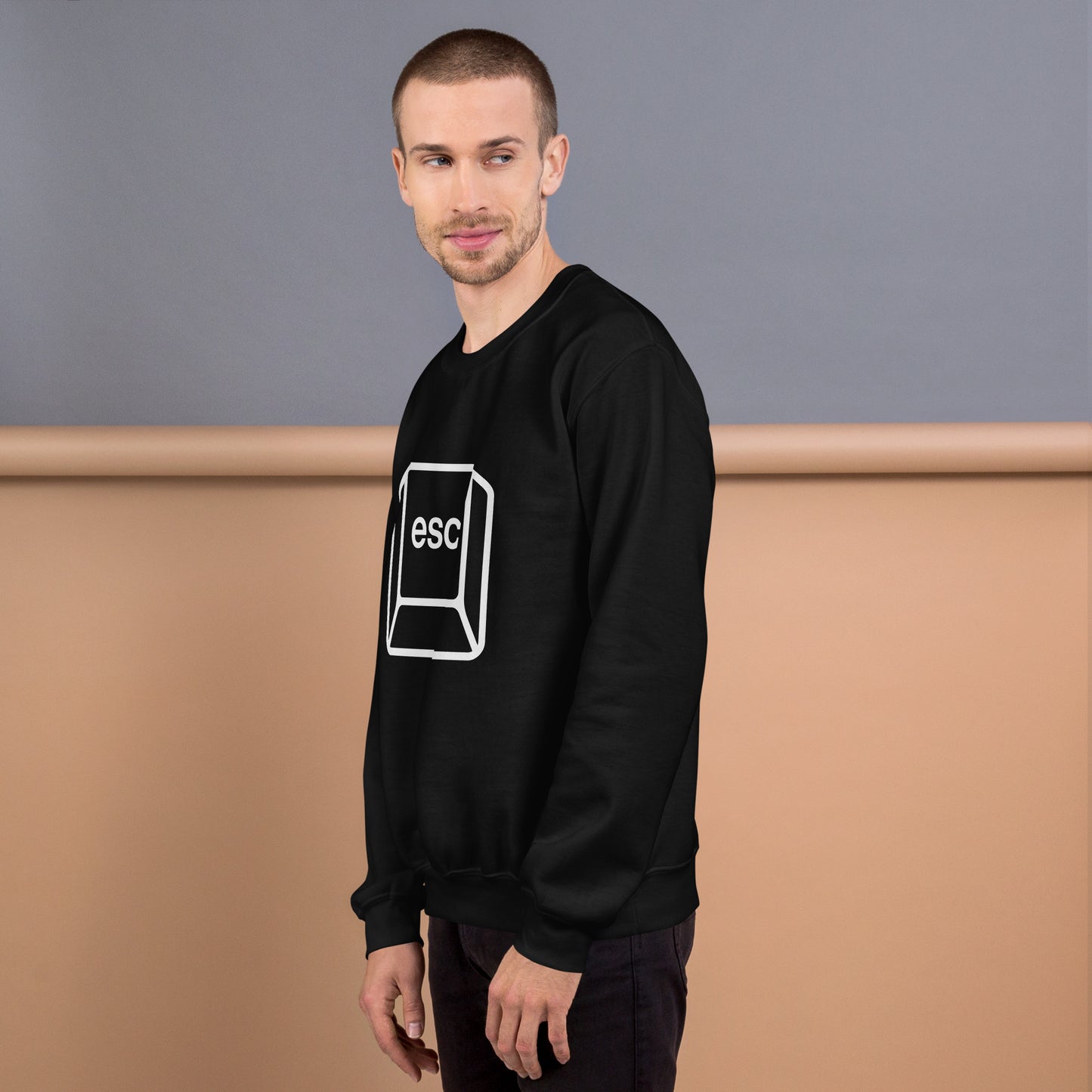Man with black sweatshirt with picture of esc key