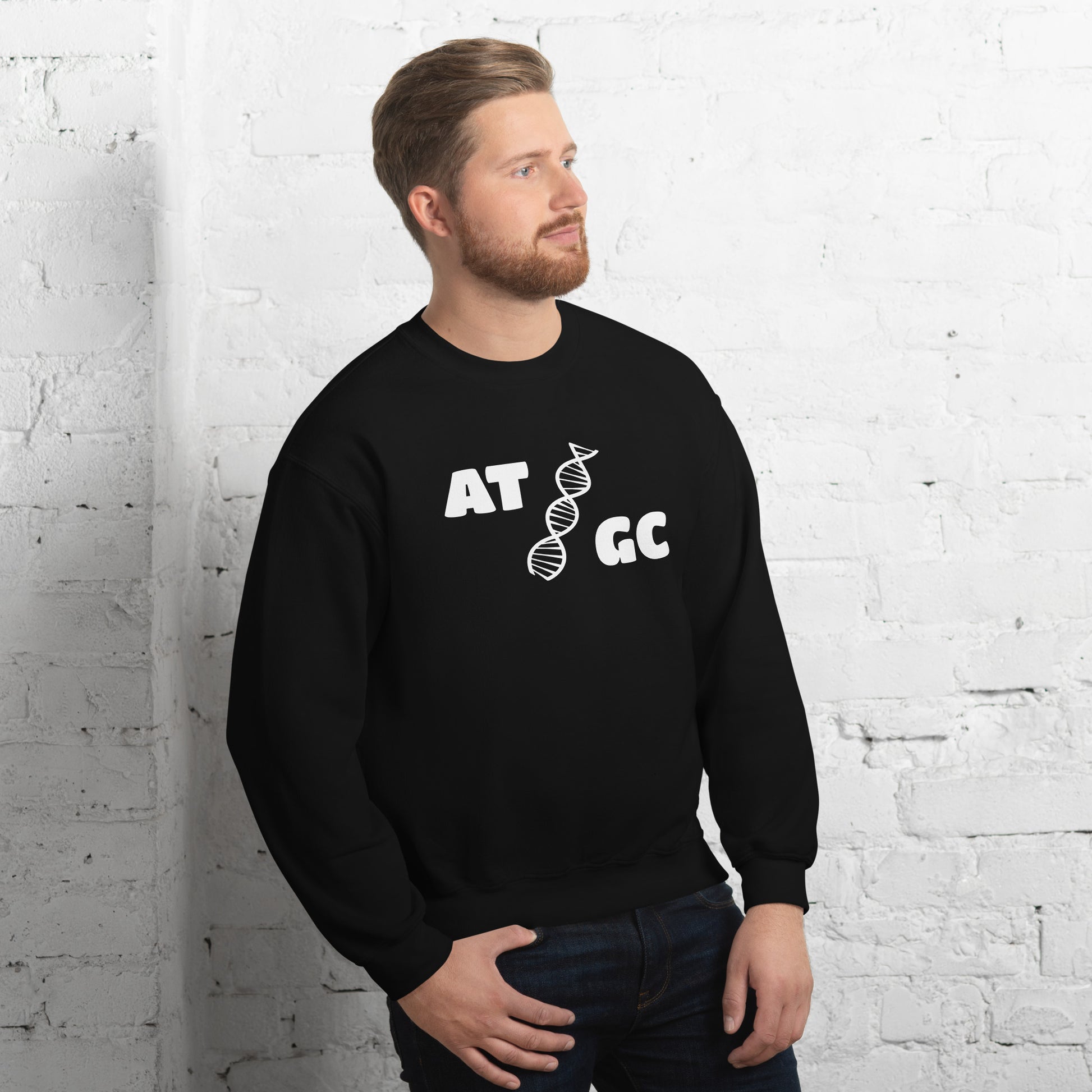 Men with black sweatshirt with image of a DNA string and the text "ATGC"