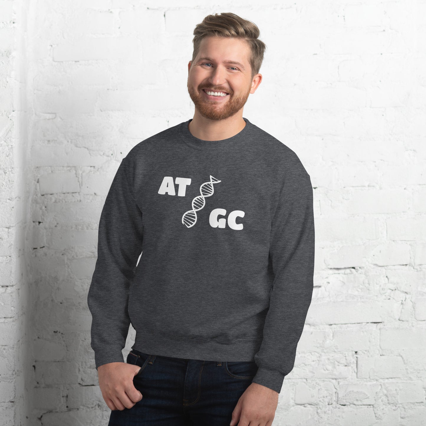 Men with dark grey sweatshirt with image of a DNA string and the text "ATGC"