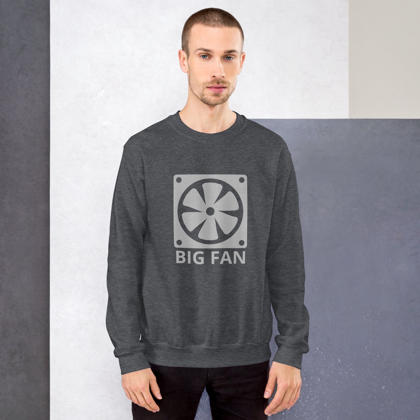 Men with dark grey sweatshirt with image of a big computer fan and the text "BIG FAN"
