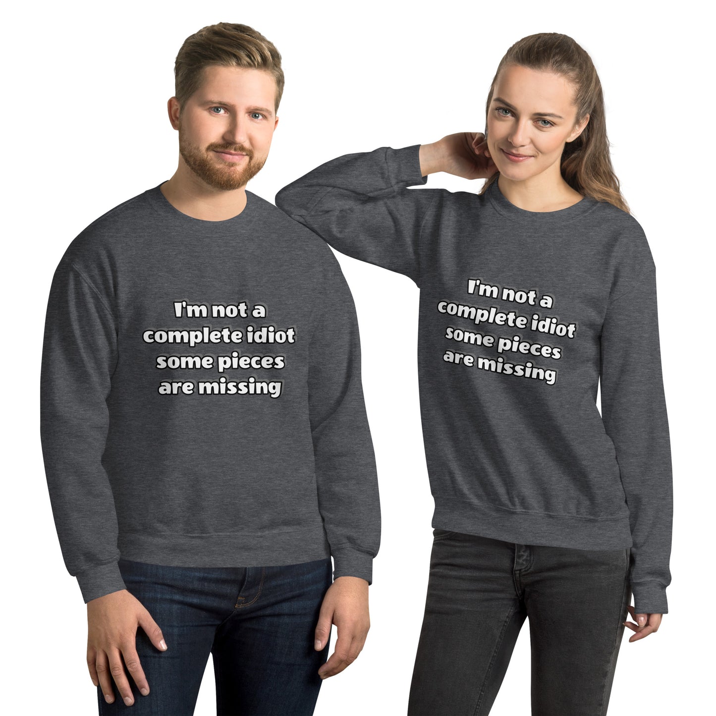Man and women with dark grey sweatshirt with text “I’m not a complete idiot, some pieces are missing”