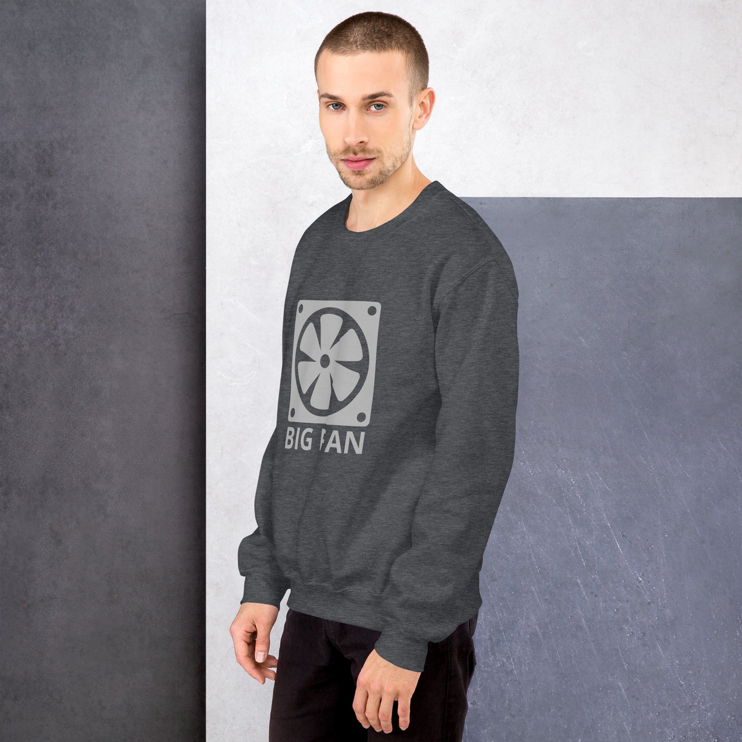 Men with dark grey sweatshirt with image of a big computer fan and the text "BIG FAN"