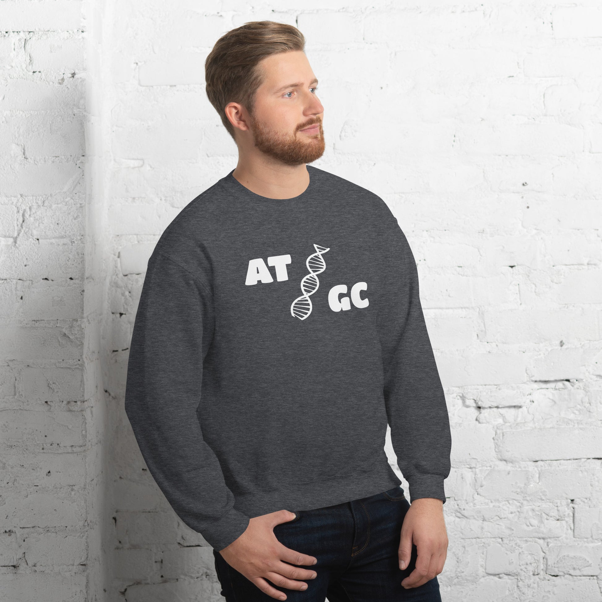 Men with dark grey sweatshirt with image of a DNA string and the text "ATGC"