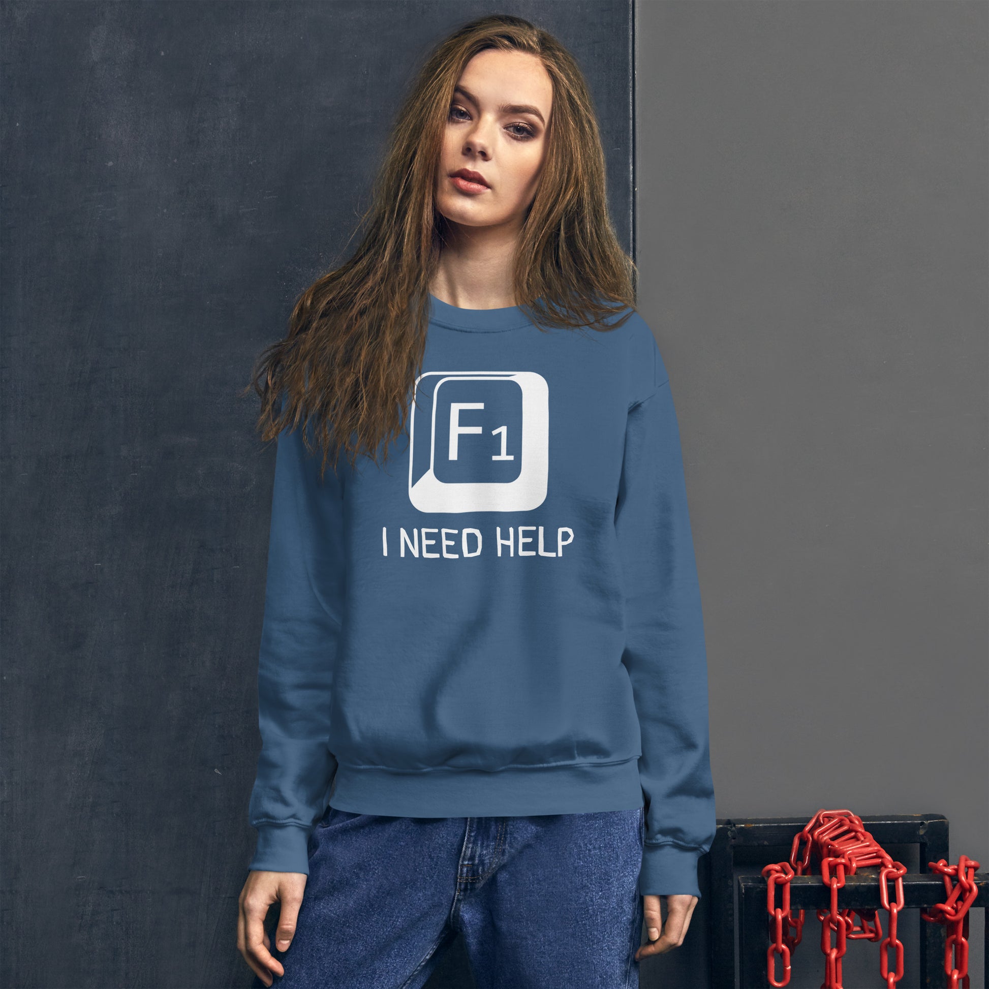 Women with indigo blue sweatshirt and a picture of F1 key with text "I need help"