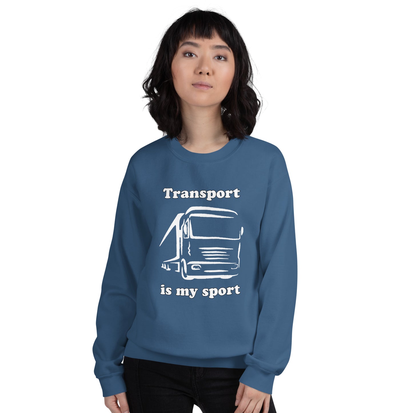 Woman with indigo blue sweatshirt with picture of truck and text "Transport is my sport"