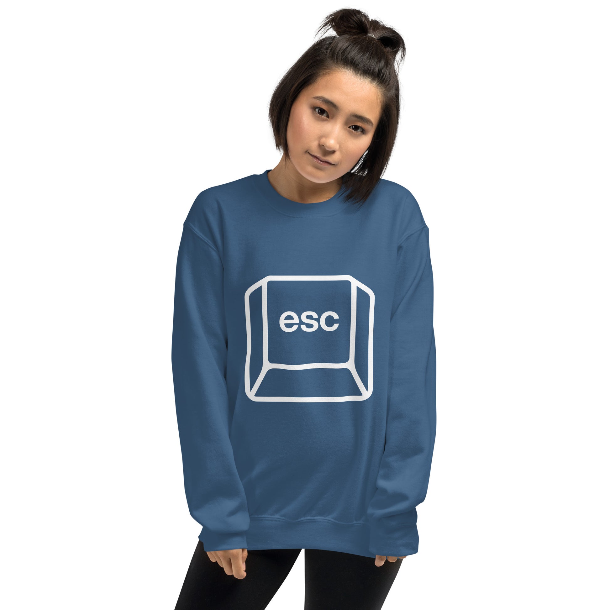 Woman with indigo blue sweatshirt with picture of esc key