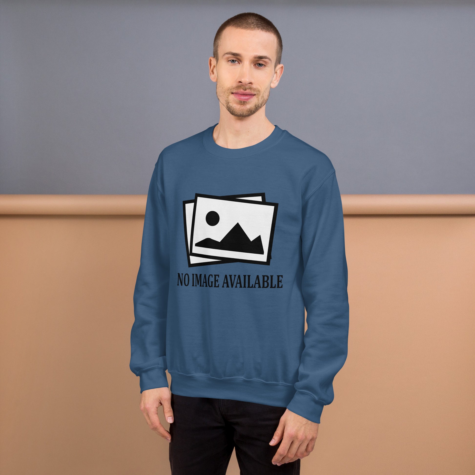Men with indigo blue sweatshirt with image and text "no image available"