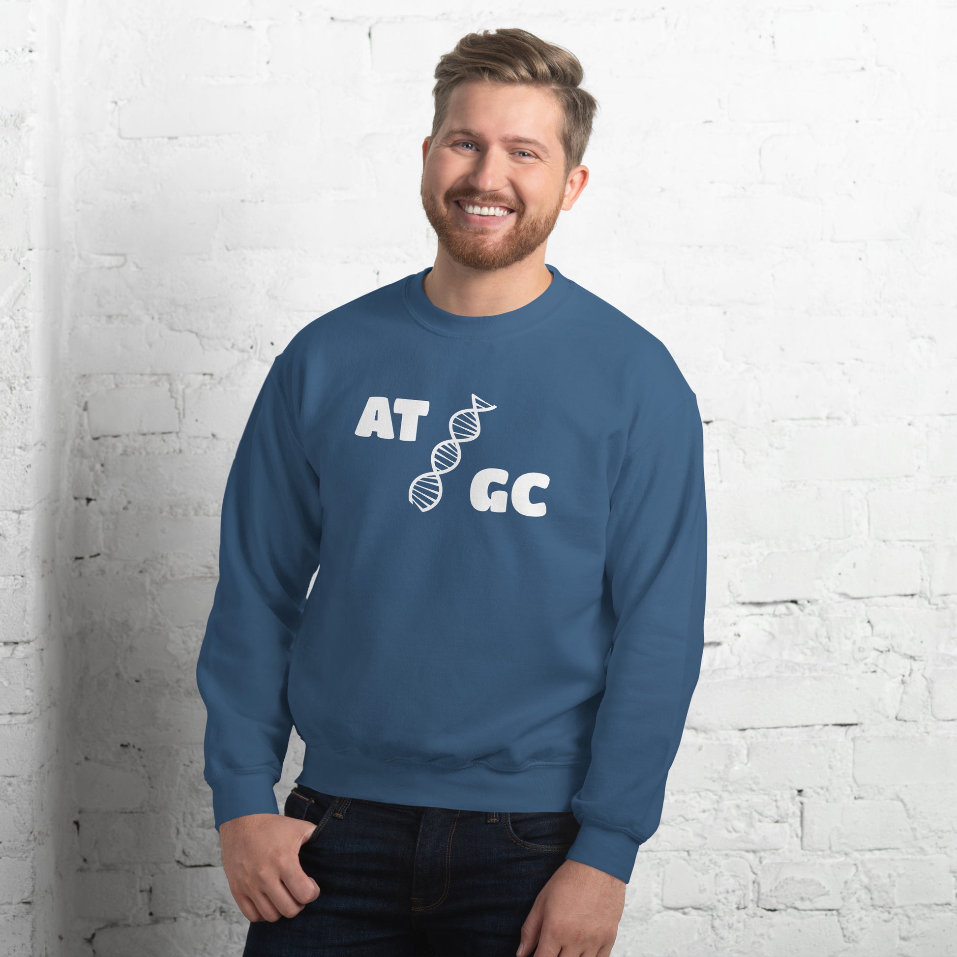 Men with indigo blue sweatshirt with image of a DNA string and the text "ATGC"
