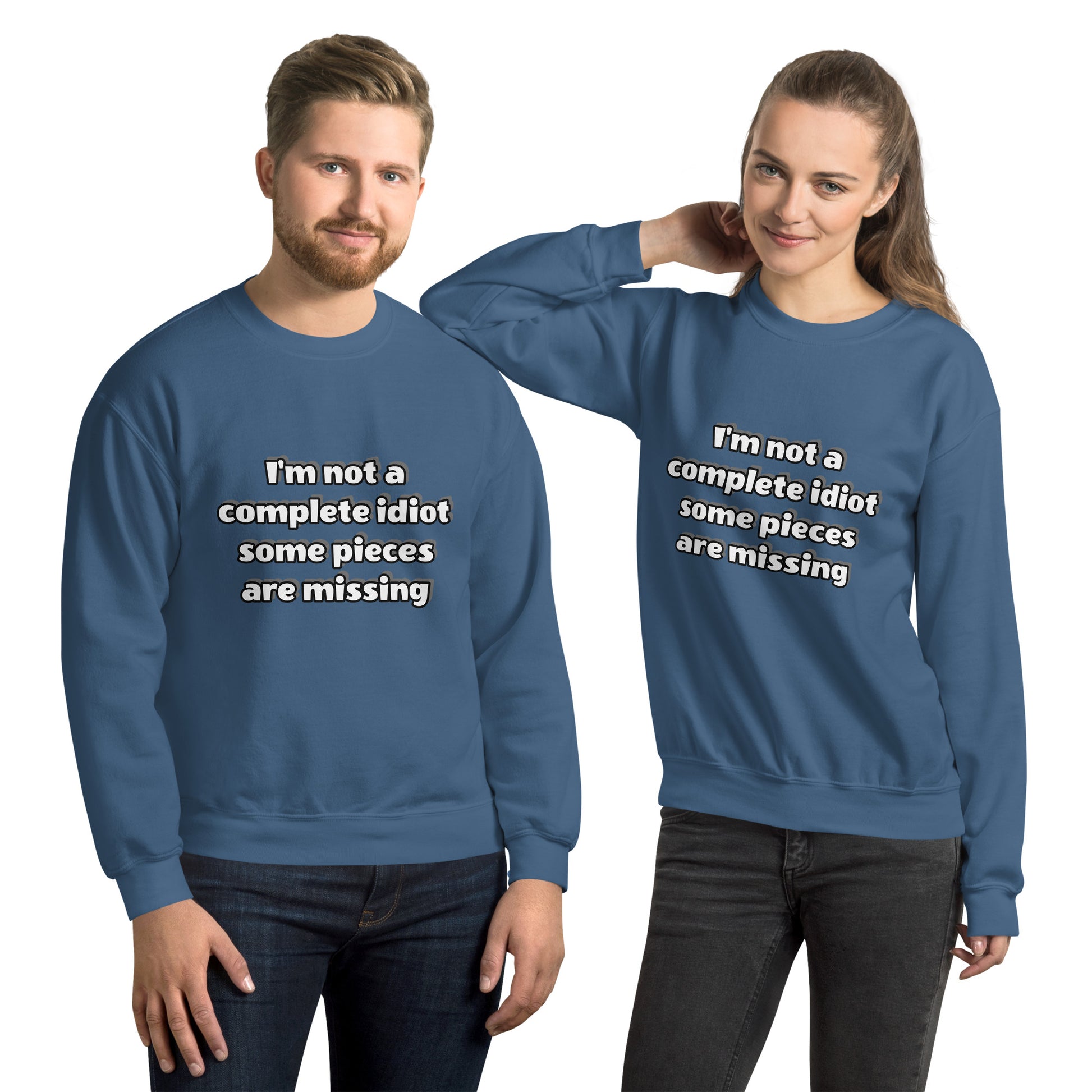Man and women with indigo blue sweatshirt with text “I’m not a complete idiot, some pieces are missing”