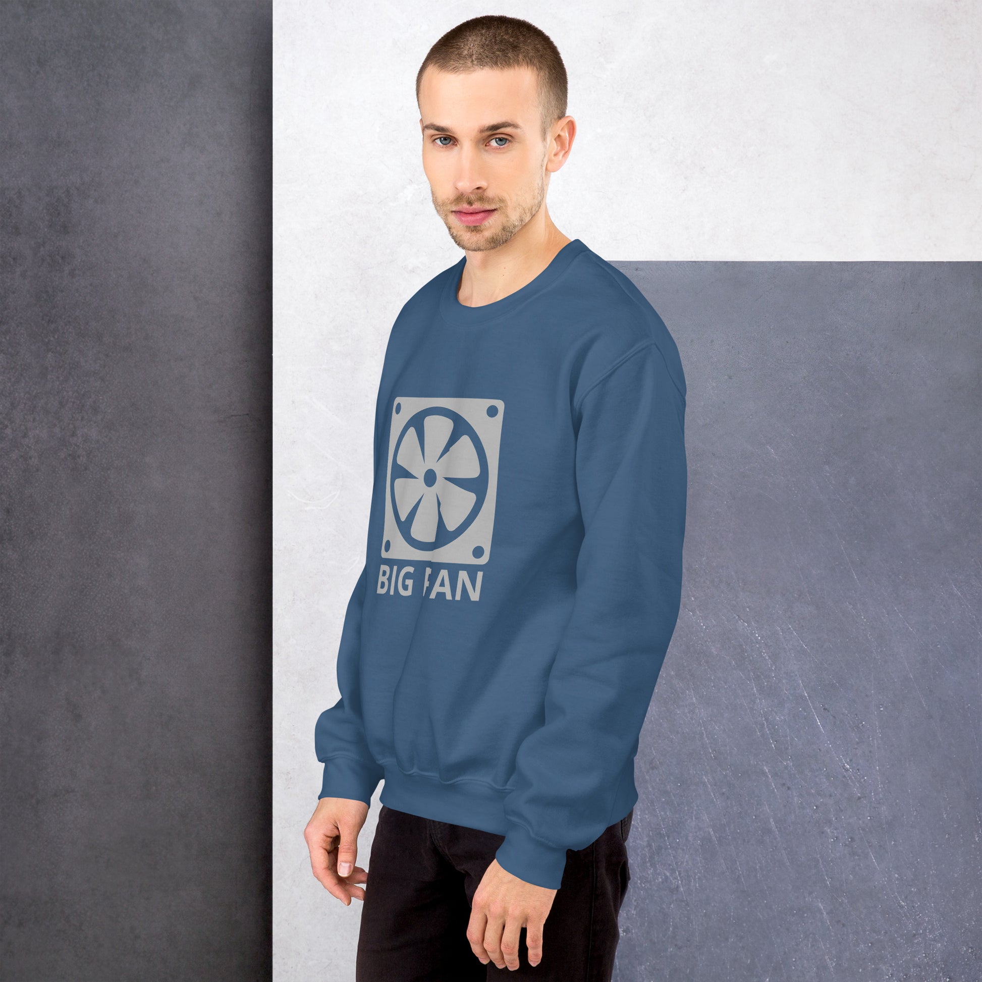 Men with indigo blue sweatshirt with image of a big computer fan and the text "BIG FAN"
