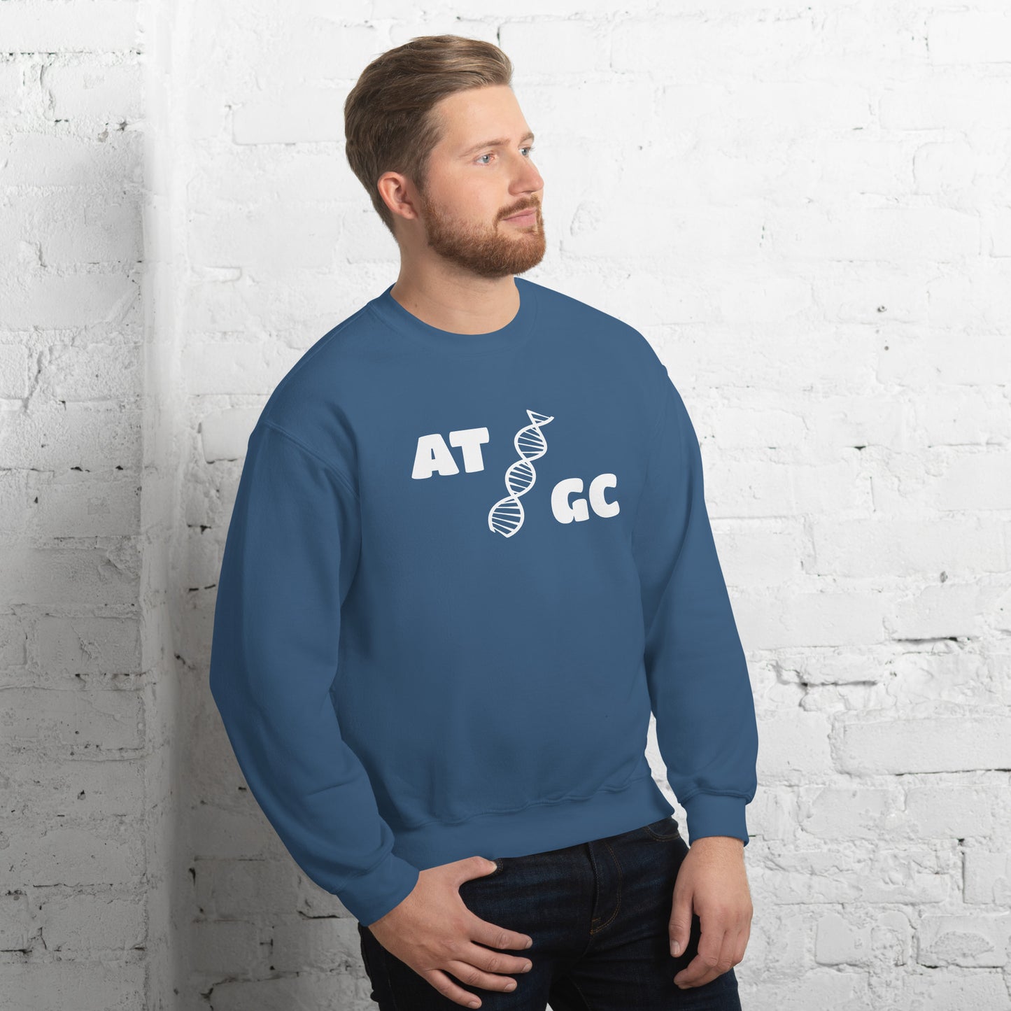 Men with indigo blue sweatshirt with image of a DNA string and the text "ATGC"