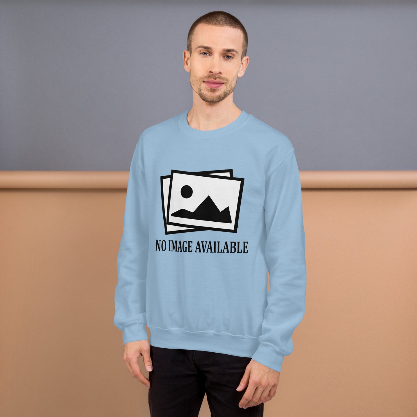 Men with light blue sweatshirt with image and text "no image available"