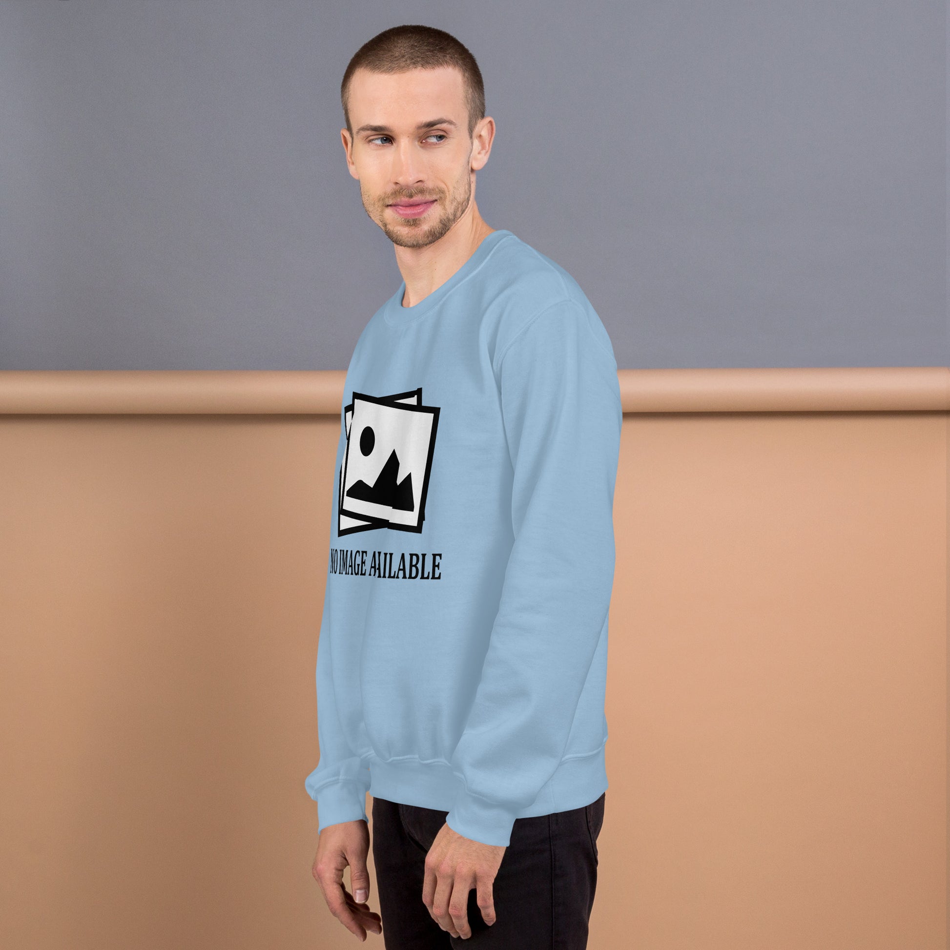 Men with light blue sweatshirt with image and text "no image available"